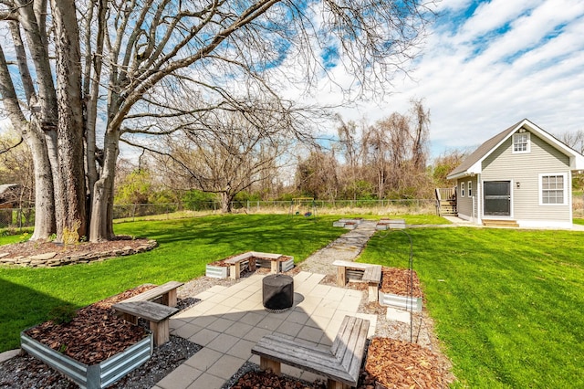 view of yard with fence and a patio area