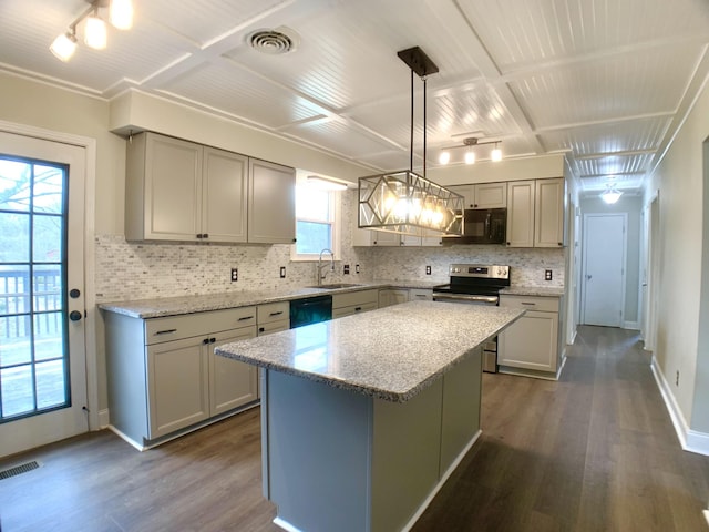 kitchen featuring gray cabinets, visible vents, hanging light fixtures, a kitchen island, and black appliances