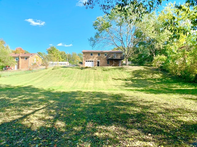 view of yard featuring a garage