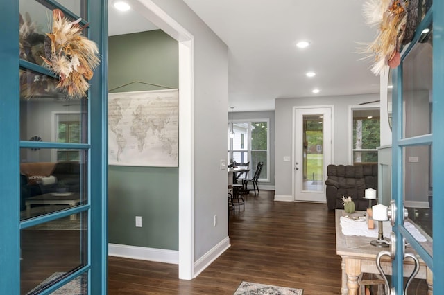 entryway with baseboards, dark wood-style flooring, and recessed lighting