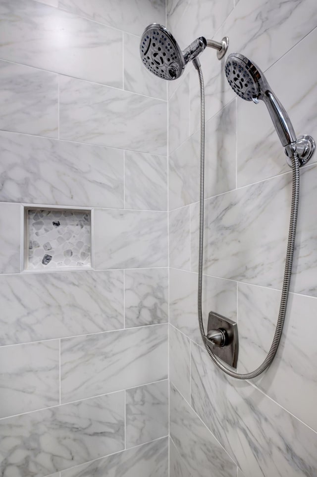 details featuring a tile shower