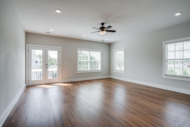 unfurnished room with french doors, dark wood finished floors, recessed lighting, ceiling fan, and baseboards