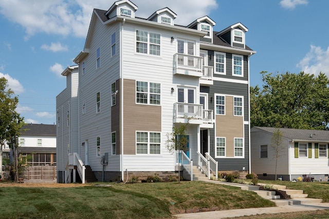 view of front facade featuring a front yard