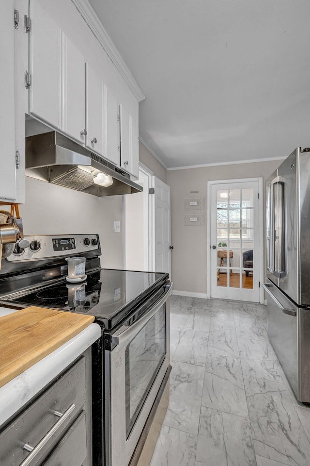 kitchen with stainless steel appliances, light countertops, white cabinetry, and under cabinet range hood