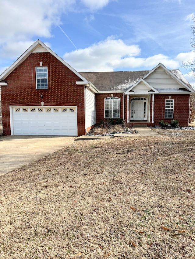 ranch-style house featuring driveway, a garage, and brick siding