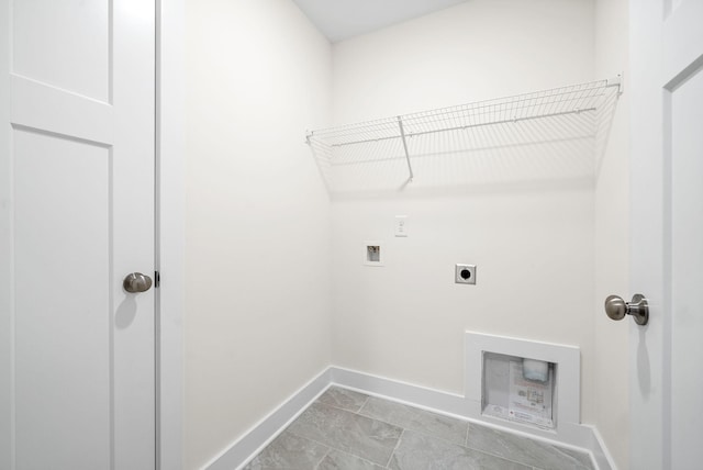 washroom with baseboards, laundry area, washer hookup, and hookup for an electric dryer