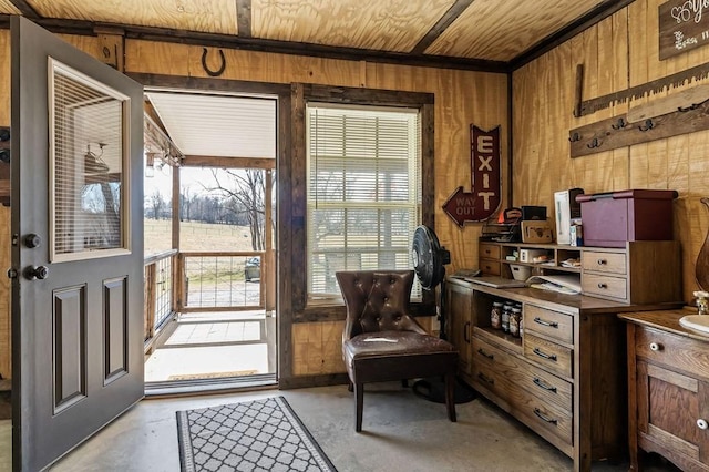 office space featuring wooden ceiling, concrete floors, and wooden walls