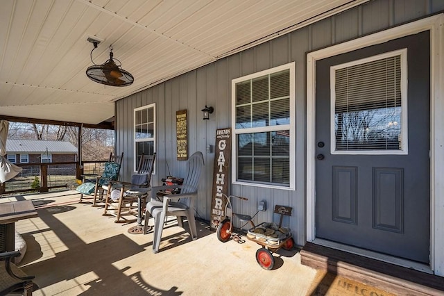 view of patio featuring a porch