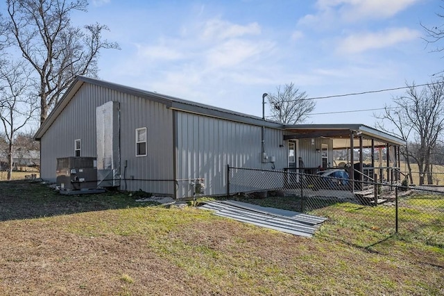 view of outdoor structure with fence and cooling unit