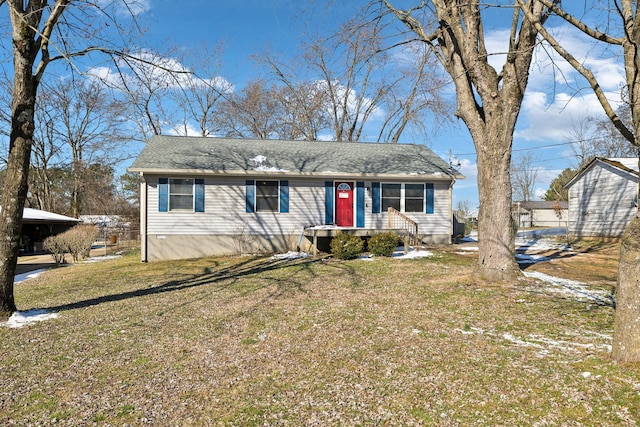 view of front of house featuring a front lawn and crawl space