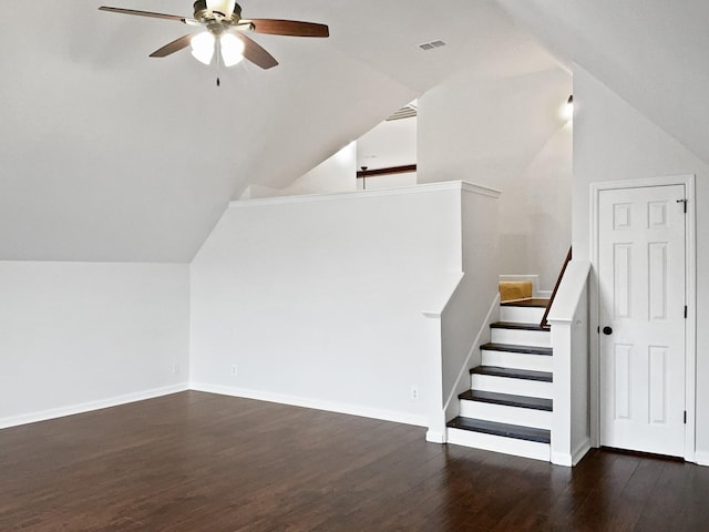 bonus room with dark wood-style flooring, visible vents, vaulted ceiling, and ceiling fan