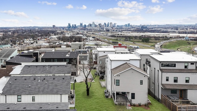 drone / aerial view featuring a city view