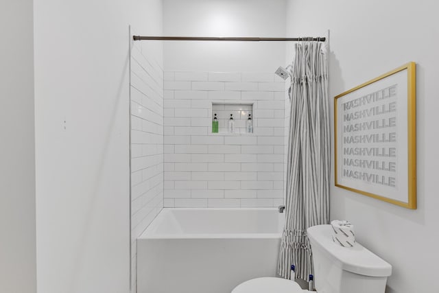 full bathroom featuring shower / tub combo and toilet