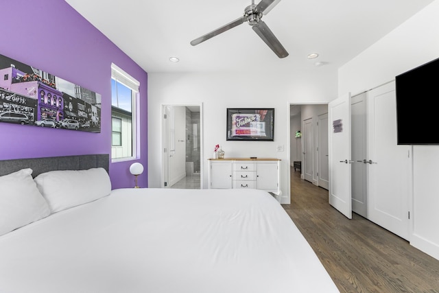 bedroom featuring baseboards, a ceiling fan, ensuite bath, dark wood-type flooring, and recessed lighting