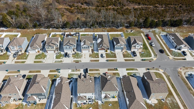 birds eye view of property with a residential view