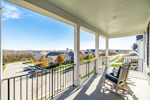 balcony featuring a residential view