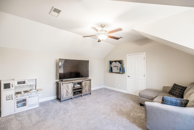 living room featuring baseboards, visible vents, light colored carpet, ceiling fan, and vaulted ceiling