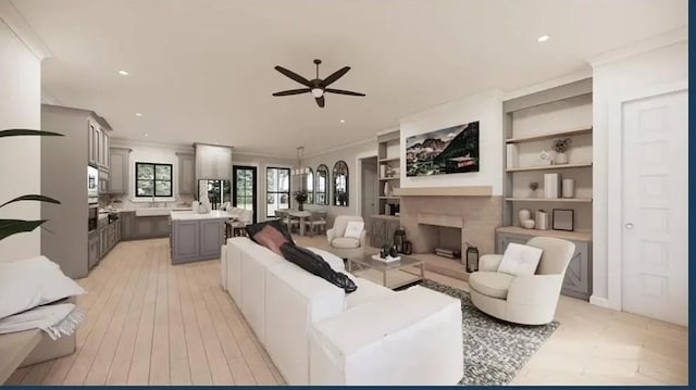 living room with light wood-style flooring, ceiling fan, crown molding, a fireplace, and recessed lighting