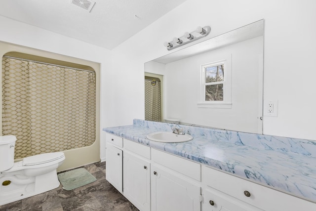 bathroom featuring toilet, visible vents, shower / bath combo with shower curtain, and vanity