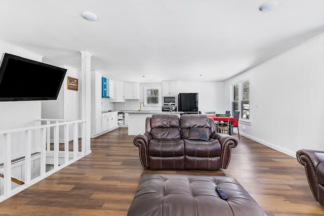 living area with dark wood-type flooring