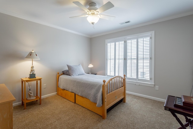 bedroom featuring baseboards, visible vents, crown molding, and light colored carpet