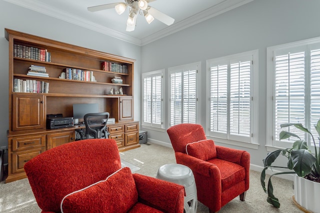 home office with a ceiling fan, light carpet, crown molding, and baseboards