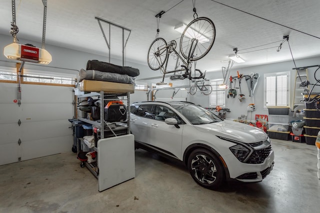 garage featuring a garage door opener