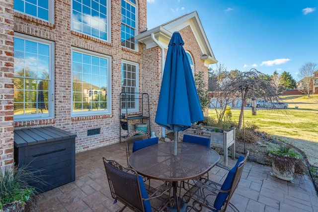 view of patio with outdoor dining area