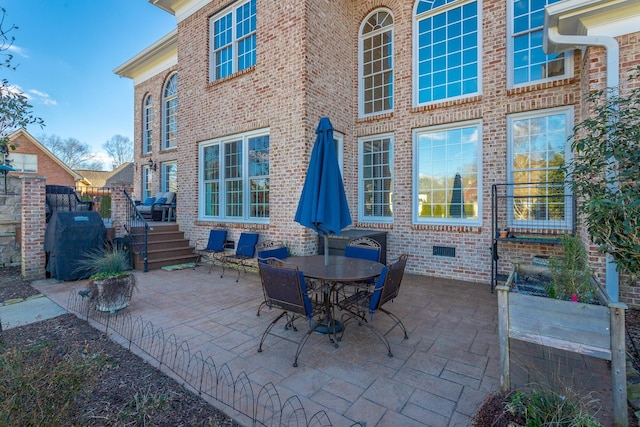 view of patio / terrace featuring outdoor dining space and fence