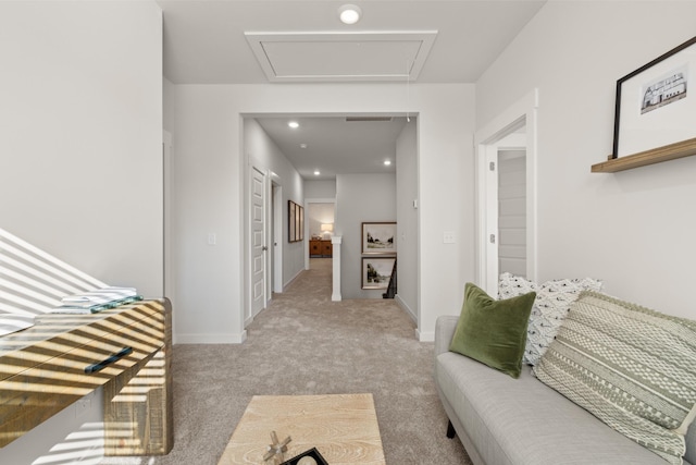 corridor with recessed lighting, baseboards, and light colored carpet