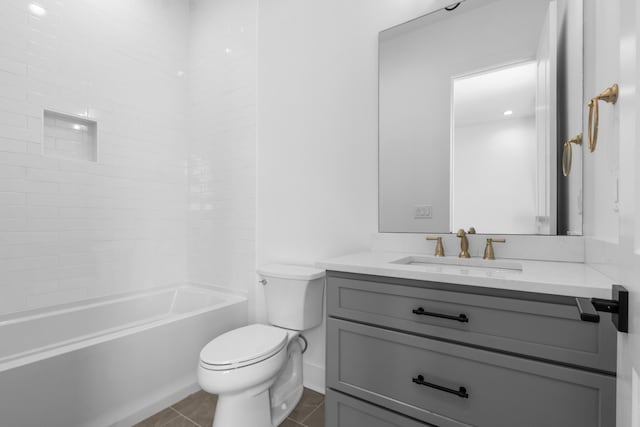 bathroom with tile patterned flooring, shower / bath combination, vanity, and toilet