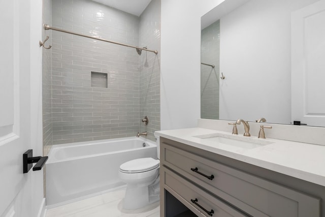 bathroom with shower / bath combination, vanity, and toilet