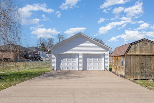 detached garage with fence