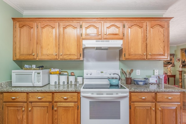 kitchen featuring ornamental molding, white appliances, light stone countertops, and under cabinet range hood