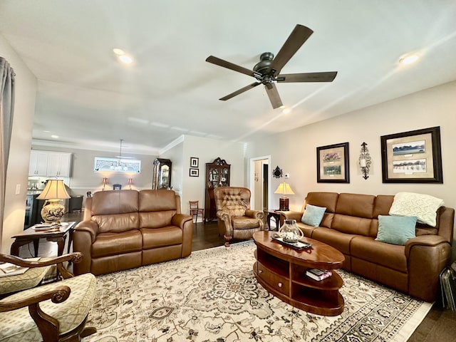 living room featuring a ceiling fan and recessed lighting