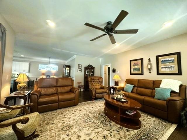 living area featuring ceiling fan and wood finished floors