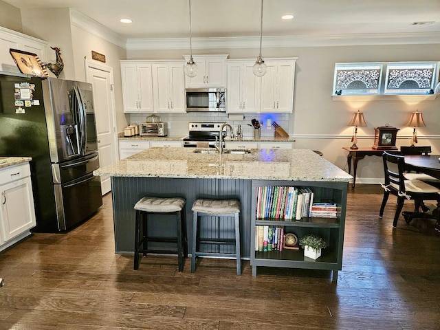 kitchen with stainless steel appliances, dark wood-type flooring, open shelves, and white cabinets