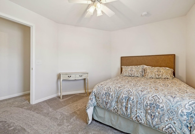 bedroom with carpet floors, ceiling fan, and baseboards