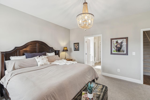 bedroom featuring baseboards, a chandelier, and light colored carpet