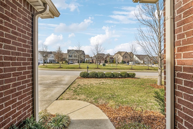 view of yard with a residential view