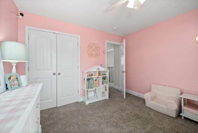 playroom with carpet flooring, ceiling fan, and baseboards