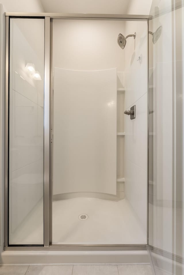 bathroom featuring a shower stall