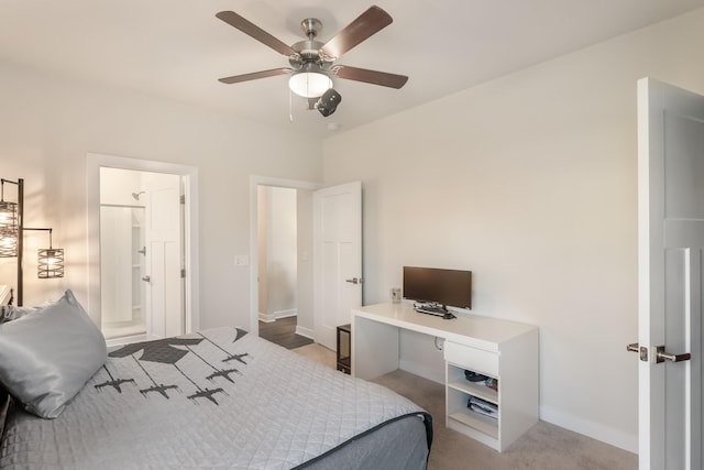 bedroom with ceiling fan and baseboards