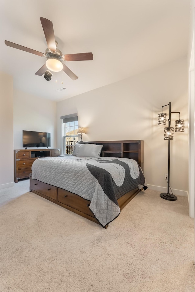 bedroom featuring carpet floors, baseboards, and a ceiling fan