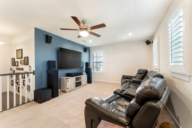 living area with carpet floors, recessed lighting, a ceiling fan, and baseboards