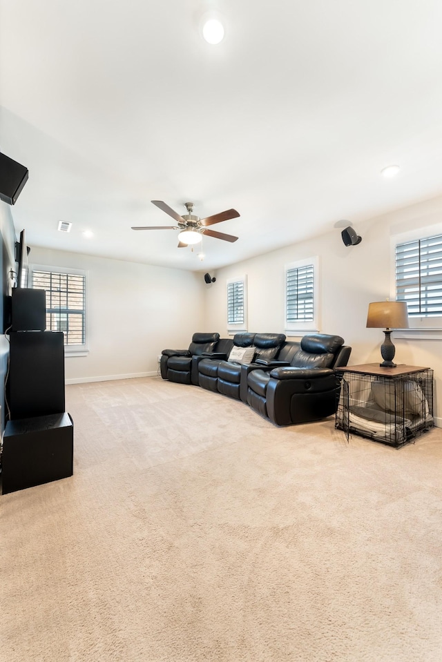 living room featuring a ceiling fan, baseboards, carpet flooring, and recessed lighting