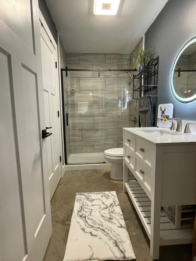 bathroom with toilet, a stall shower, unfinished concrete floors, and vanity