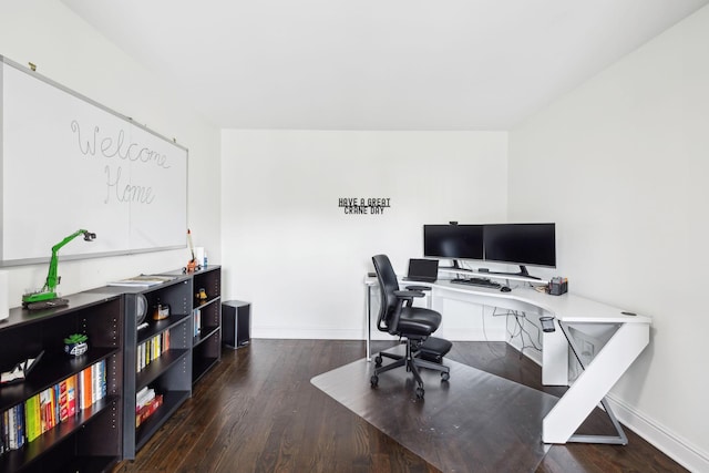 home office featuring dark wood finished floors and baseboards