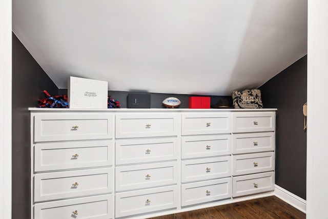 details with baseboards and wood finished floors