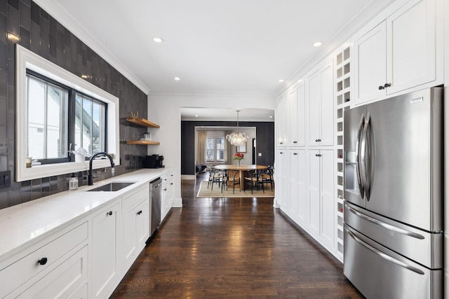 kitchen with stainless steel appliances, white cabinets, and open shelves